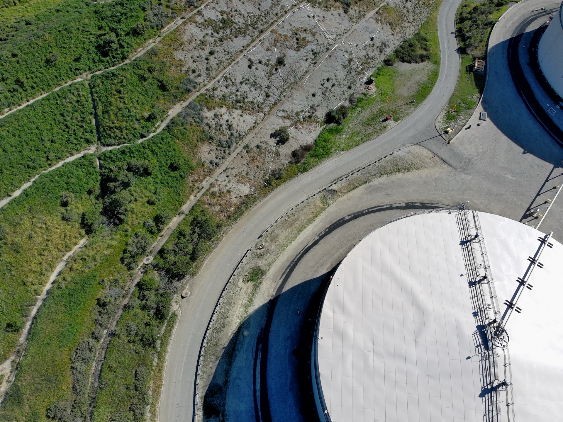 Large industrial storage tank viewed from above