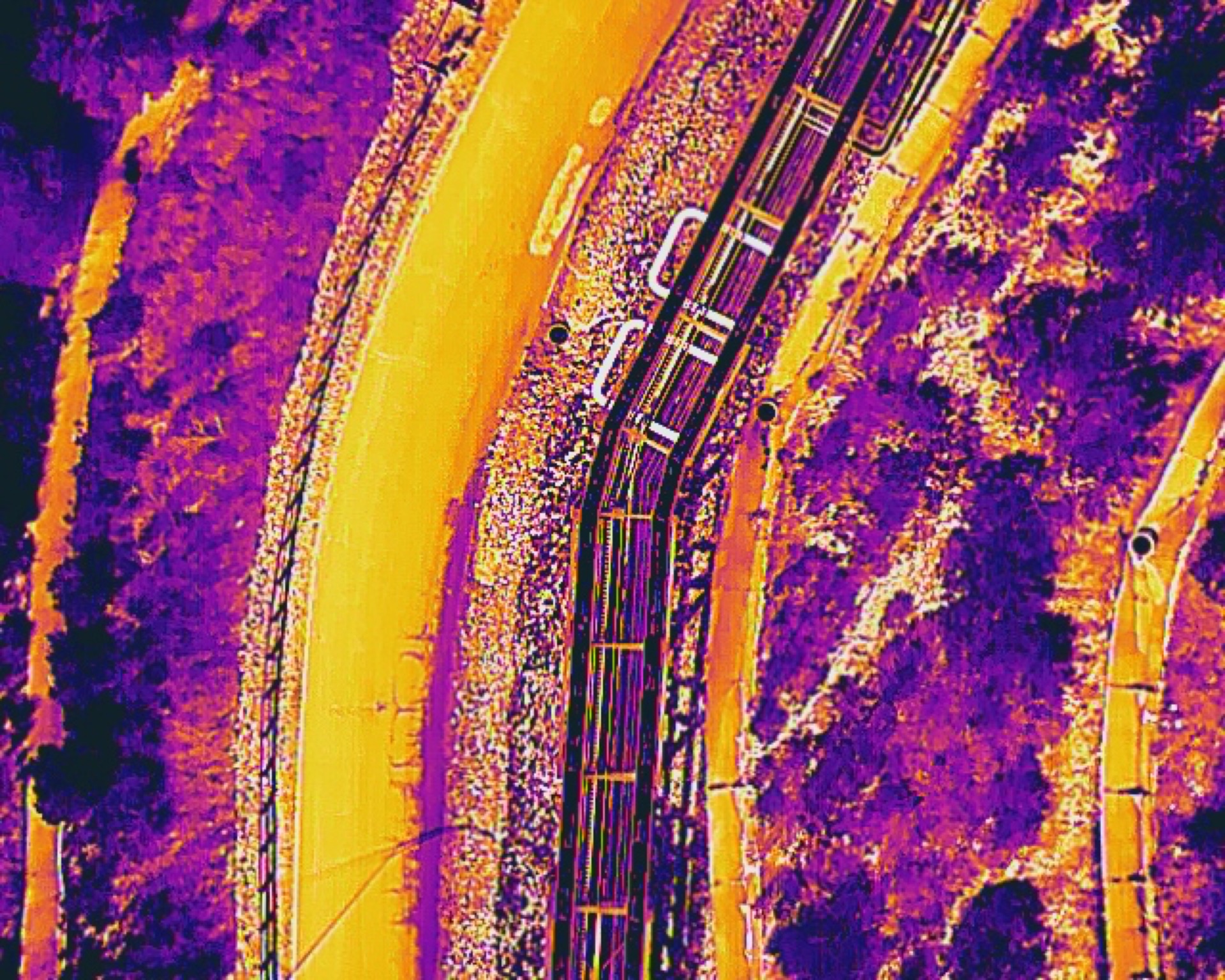 Thermal scan showing heat signatures along pipeline