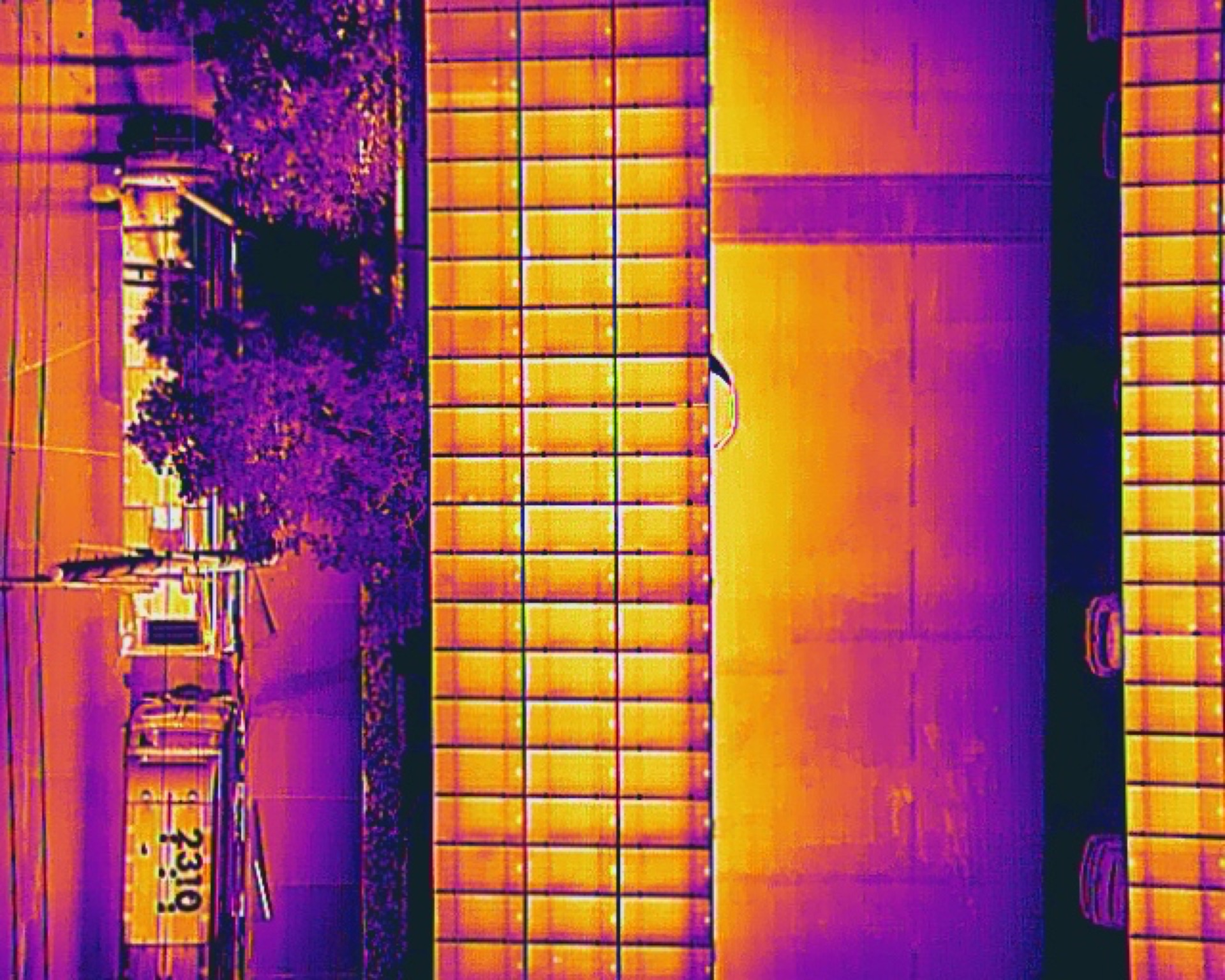 Thermal image of rooftop solar panels